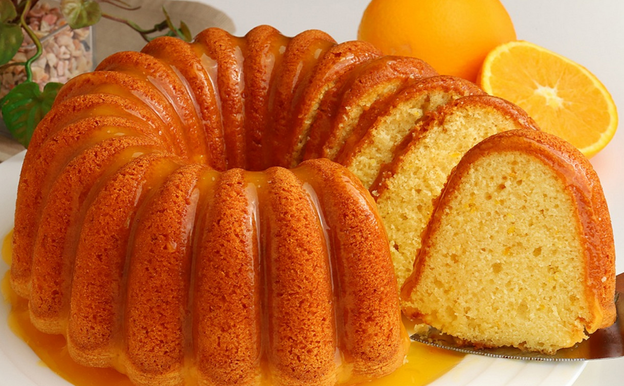 اعملى احلي كيكة لأولادك.. طريقة عمل كيكة البرتقال هشة وطرية في المنزل زي المحلات