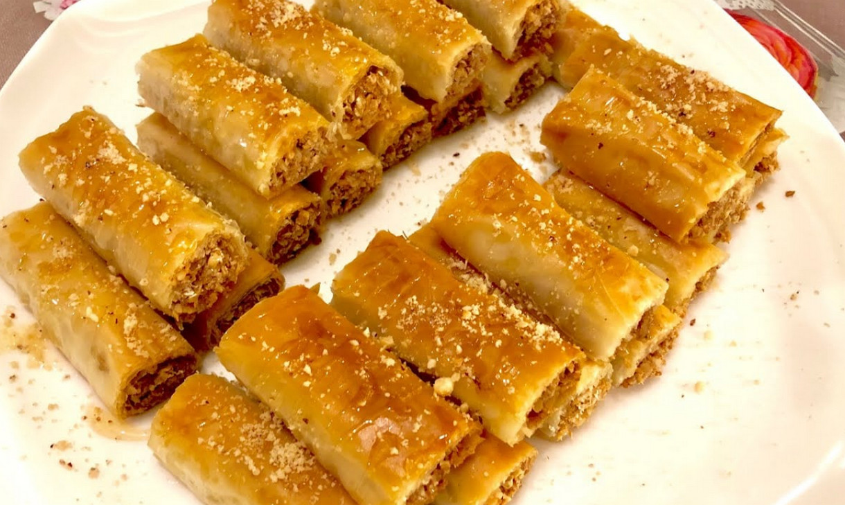 جهزي حلويات رمضان.. طريقة عمل أصابع الجلاش بالكنافة اللذيذة خطوة بخطوة في المنزل